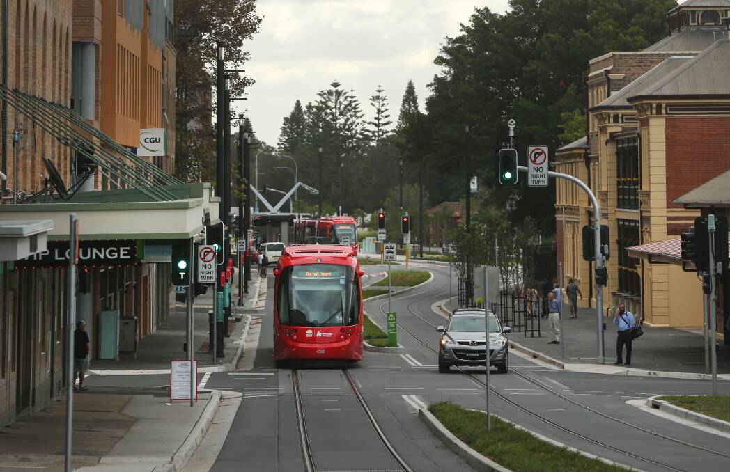 MOVING: The tram moves down Scott Street. Picture: Marina Neil