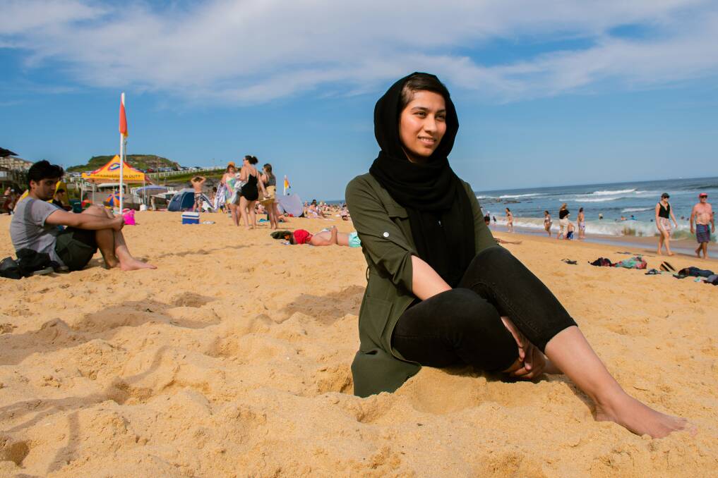 "The first time (I came to the beach) was really scary for me ... Now, it feels good to come to the beach. I can swim with my mates and it's really fun." - Khadiija Ahmadi . Picture: Simon McCarthy