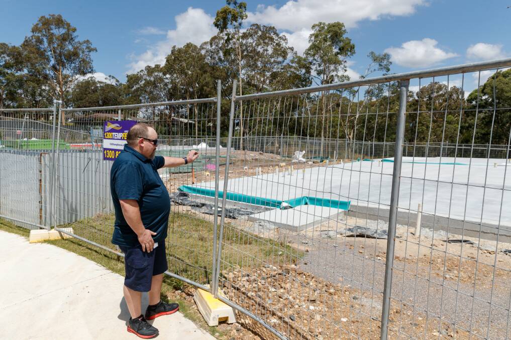 Nathan Whyte-Southcomb has also been impacted by the collapse of Privium Homes, which were building his house in the Heritage Parc development in Rutherford. Pictured with the concrete slab where his house was to be built. Picture: Marina Neil