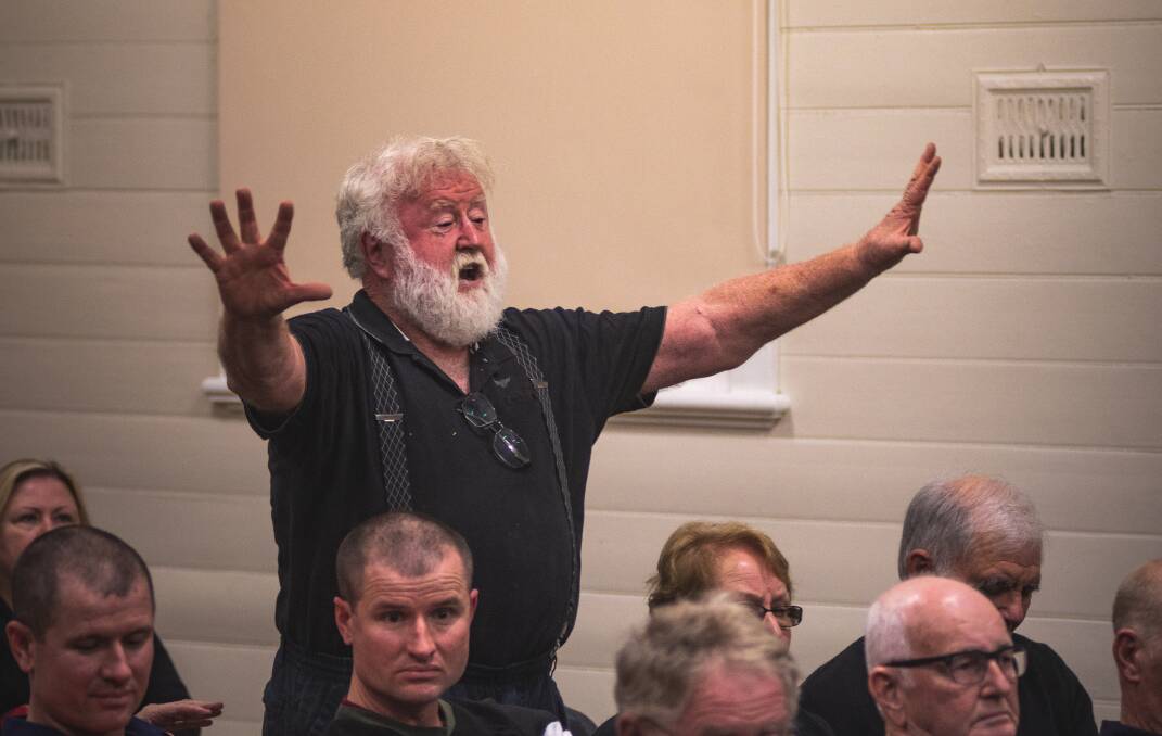 UNHAPPY: Salt Ash resident Dennis McCarron unleashed at the Paterson federal election candidates' forum in Williamtown on Monday night. Picture: Simon McCarthy