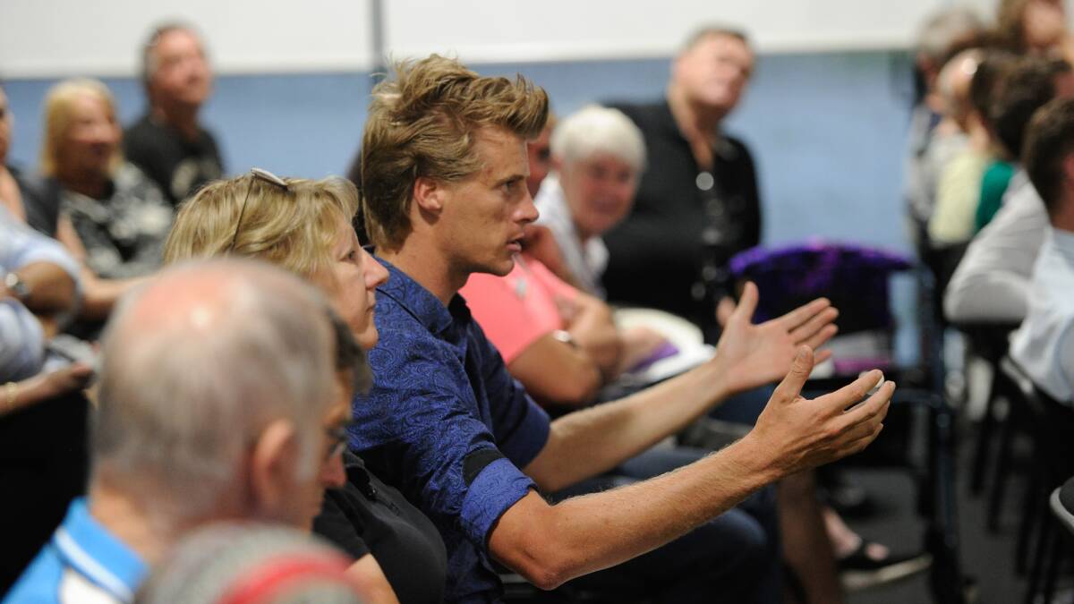 FED UP: Williamtown residents at a community meeting with Defence on Tuesday night. Picture: Marina Neil
