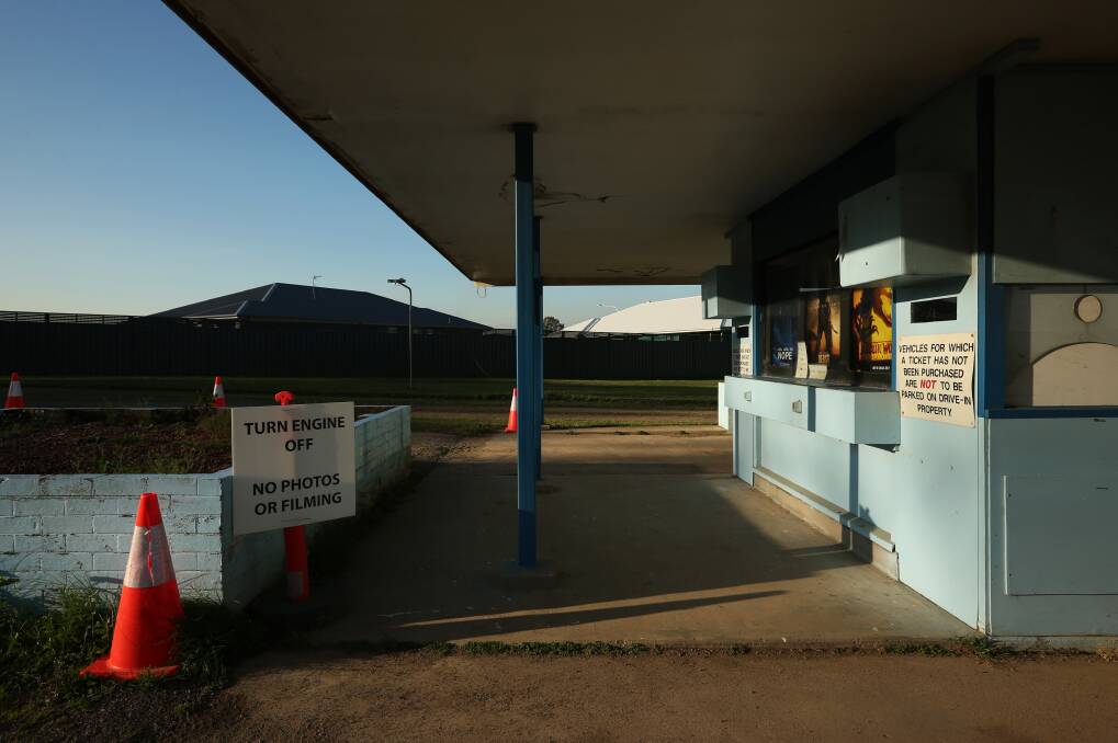 The ticket booth area at Heddon Greta Drive-In and housing rooflines in the background. Picture by Simone De Peak
