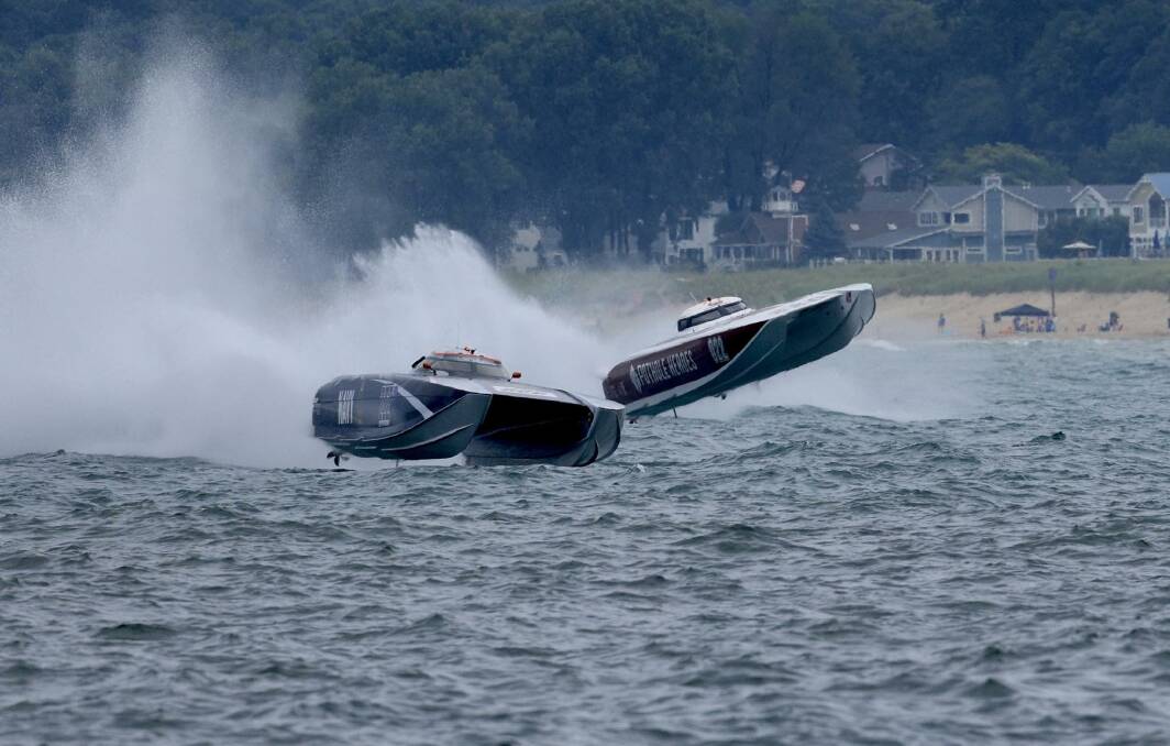 The Nicholson team's 222 offshore powerboat on the water.