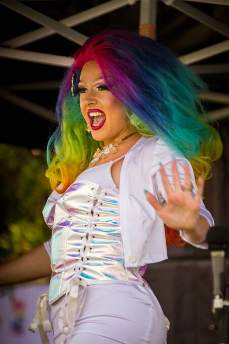 Drag performer Indi Pendant performs 'Born This Way' by Lady Gaga at Foreshore Park on Saturday. Photo: Simon McCarthy