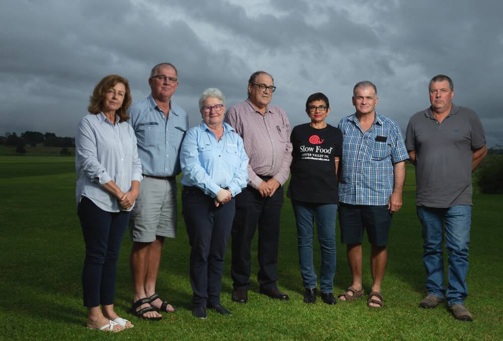 Lower Hunter Agricultural Water Users Incorporated representatives Judy Mead, Stephen Osborn, Julia Wokes, Cameron Archer, Amorelle Dempster, Stephen Sneddon and Mathew Dennis spoke at Friday night's public meeting. Pictures: Marina Neil