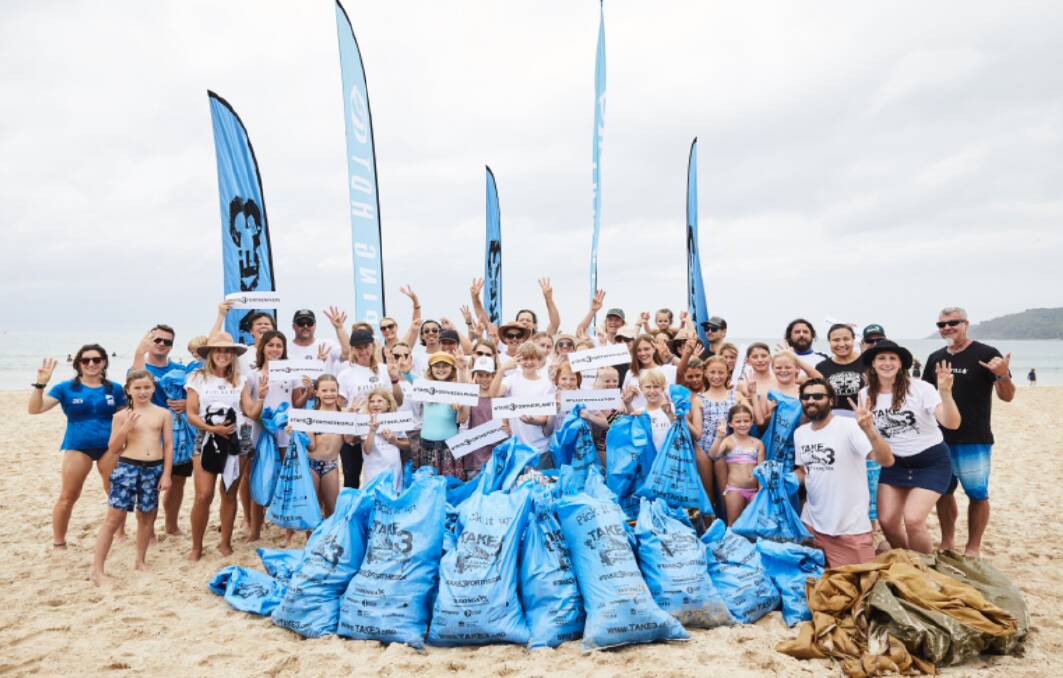 Volunteers with Take 3 for the Sea with a haul of collected plastics waste from the beach at Piping Hot.