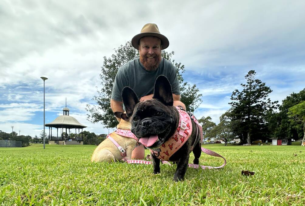 Maitland man Ashley Elphick with one of his two French Bulldogs, Winnie. Picture by Simon McCarthy