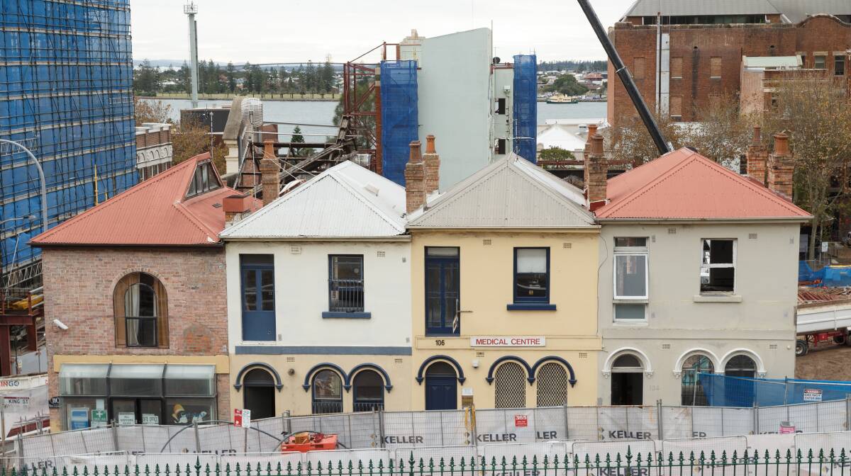 CHANGING FACE: These old terraces on King Street will become part of a larger apartment development in the centre of Newcastle. Picture: Max Mason-Hubers