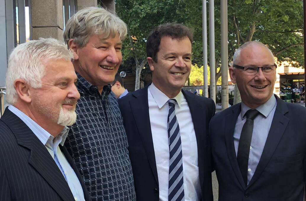 Campaigners: NSW Attorney General Mark Speakman in Sydney today with Hunter child abuse survivors (from left) Peter Gogarty and Paul Gray, and Maitland Christian Church pastor Bob Cotton (far right). The Hunter man have campaigned for tougher penalties for concealing child sexual abuse.  