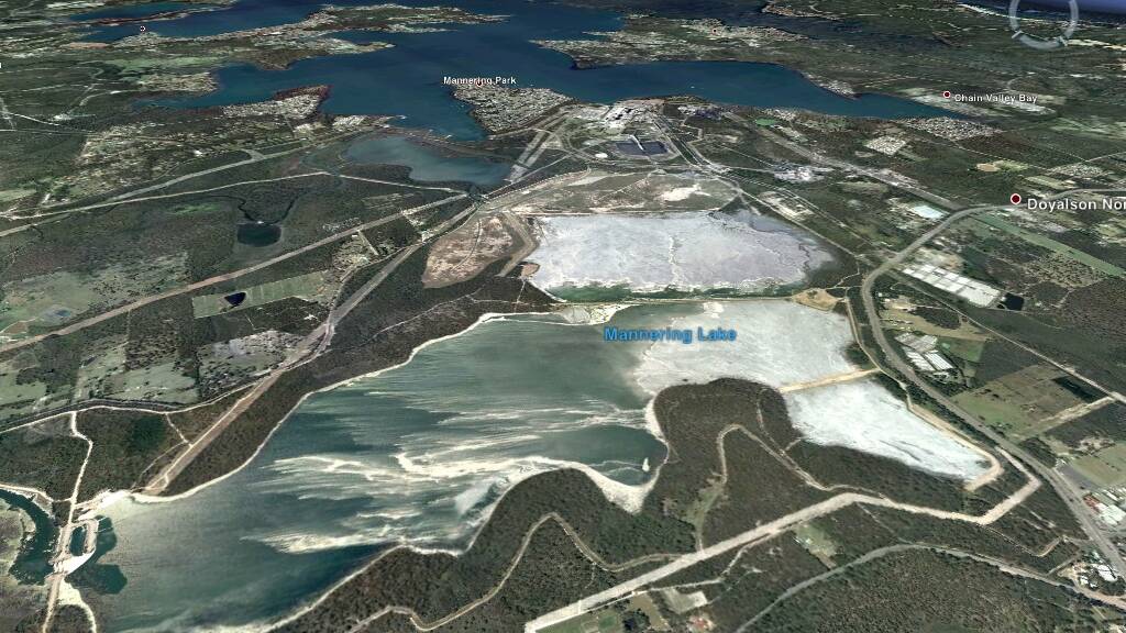 Extensive: A Google Earth view of Vales Point power station's extensive ash dam area near Lake Macquarie. The EPA has ordered the power station to clean up suspected asbestos dumped at the site in demolition waste. 