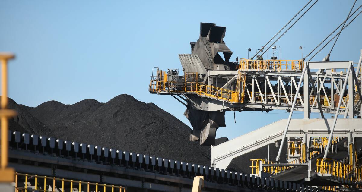 Export: Coal being loaded for export at Kooragang Island. Picture: Marina Neil. 