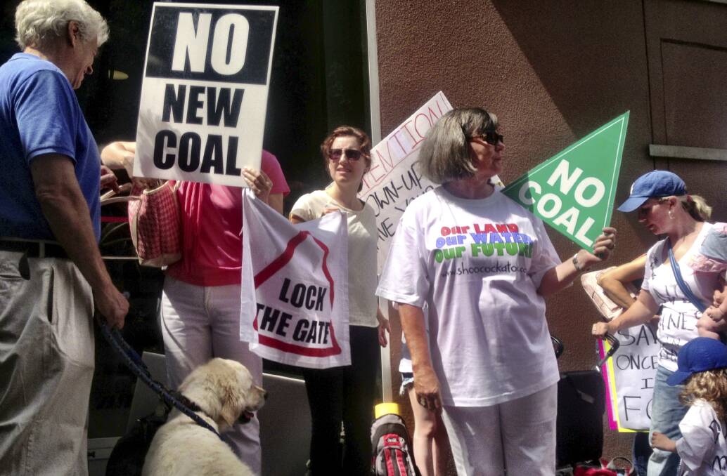 Objections: Protesters outside a NSW Planning Assessment Commission public hearing in 2017 considering the Bylong open cut coal mining proposal.