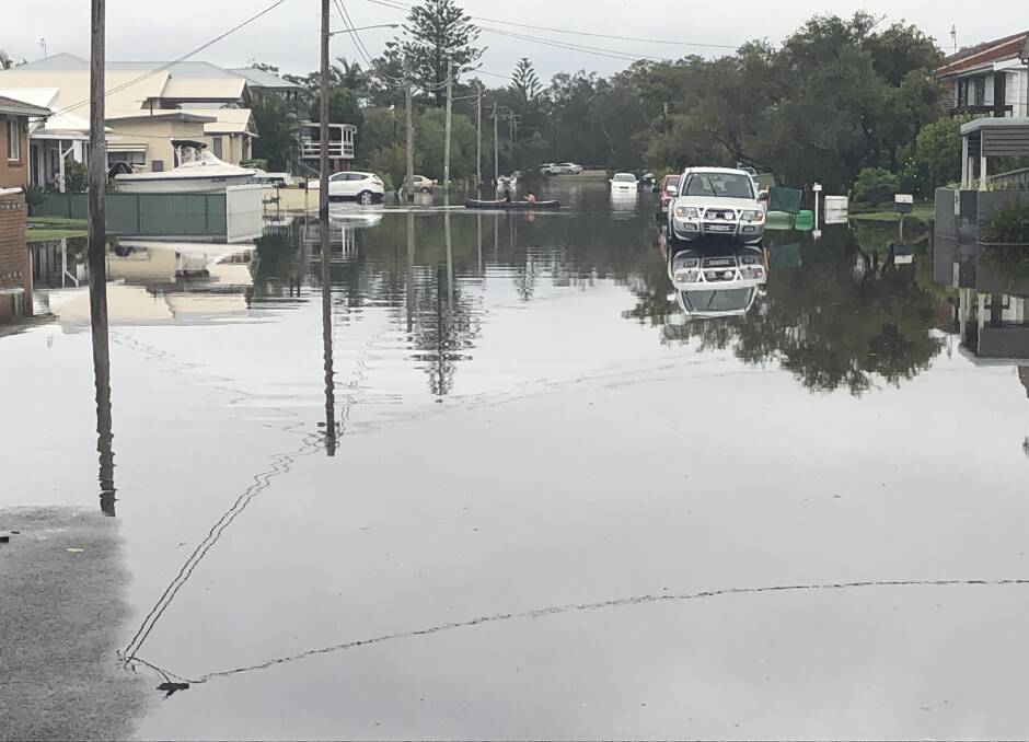 Flood: A road at North Entrance under water on Monday because of a flooded Tuggerah Lakes system. 