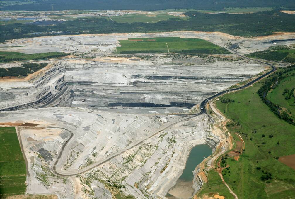 Expanses: Aerial views of Hunter open cut coal mine sites show the large expanses of disturbed mine land. 