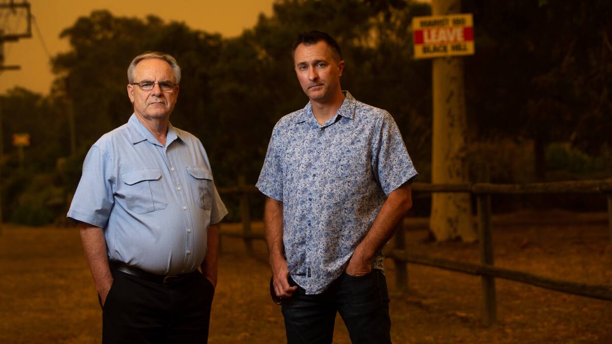 Opposition: Black Hill residents Phil Clulow and Adam Fairbairn will be in the Land and Environment Court on Wednesday as part of a bitter dispute with Catholic welfare group Marist180. Picture: Marina Neil. 