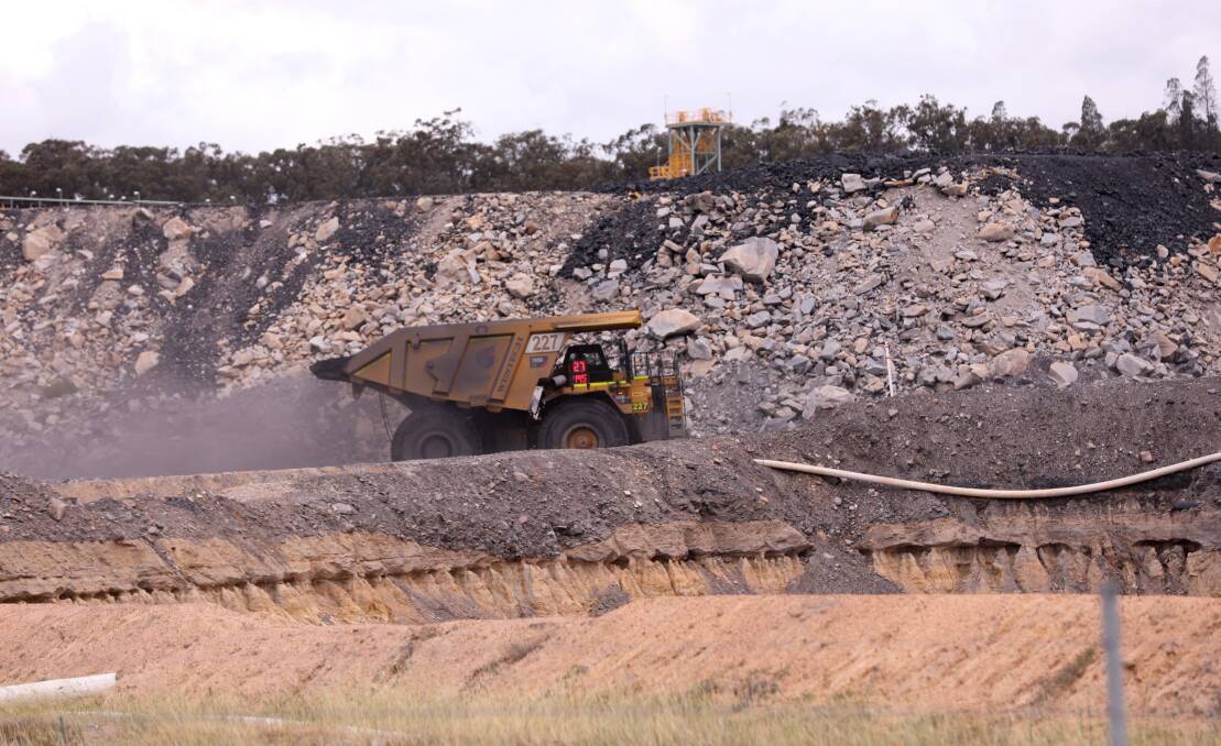 Operations: Trucks at the Moolarben mine between Denman and Mudgee, in an area where three major mines currently operate in the vicinity of the Goulburn River.