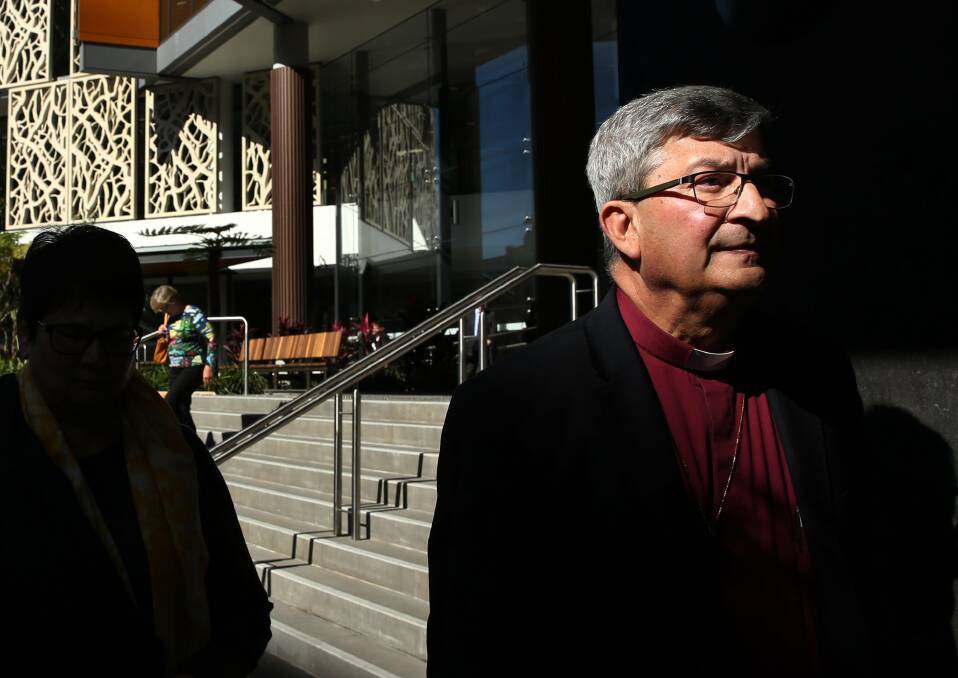 'Weak, ineffectual': A grim-faced Archbishop Roger Herft leaves Newcastle Courthouse in August after damning evidence at the Royal Commission into Institutional Responses to Child Sexual Abuse.