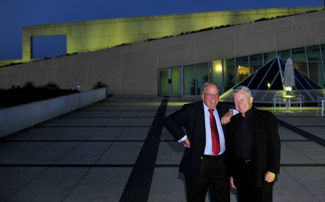 Success: David Chandler and architect Ric Thorpe outside Parliament House in Canberra. Mr Chandler was construction director for the project. Picture: Melissa Adams.