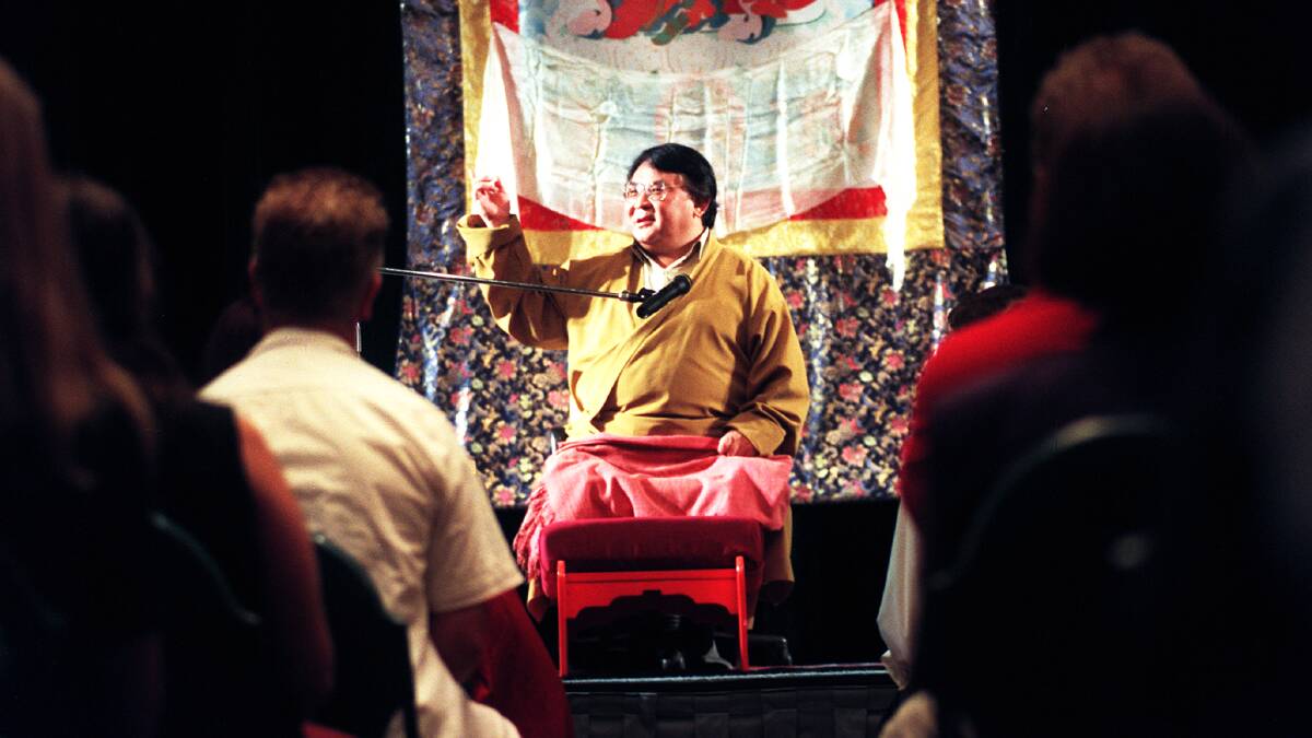 Author: A younger Sogyal Rinpoche speaks to followers in 1998 after the launch of his book, The Tibetan Book of Living and Dying, which sold millions of copies around the world. Picture: Jacky Ghossein. 