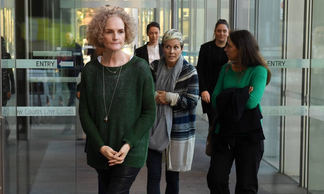 Landmark: Gai Thompson and other women left injured by pelvic mesh surgery outside the NSW Supreme Court where 1350 women are registered in a landmark class action against mesh manufacturer Johnson & Johnson.