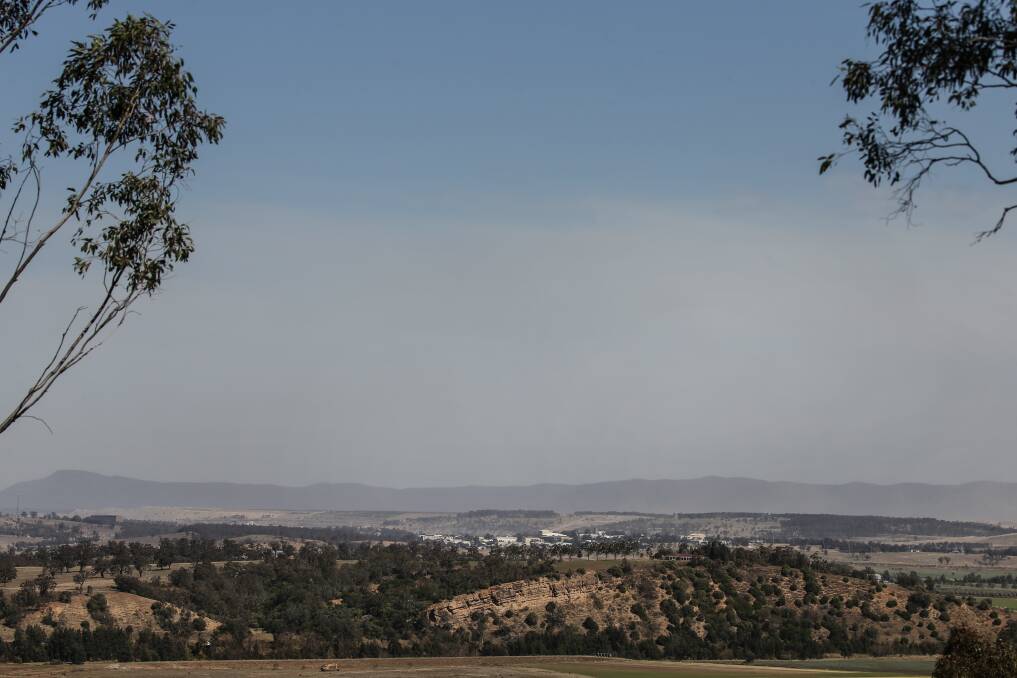 Visible: A dust haze hangs over the Mount Thorley Warkworth coal mine site as Upper Hunter residents argue their health is compromised. Picture: Marina Neil.