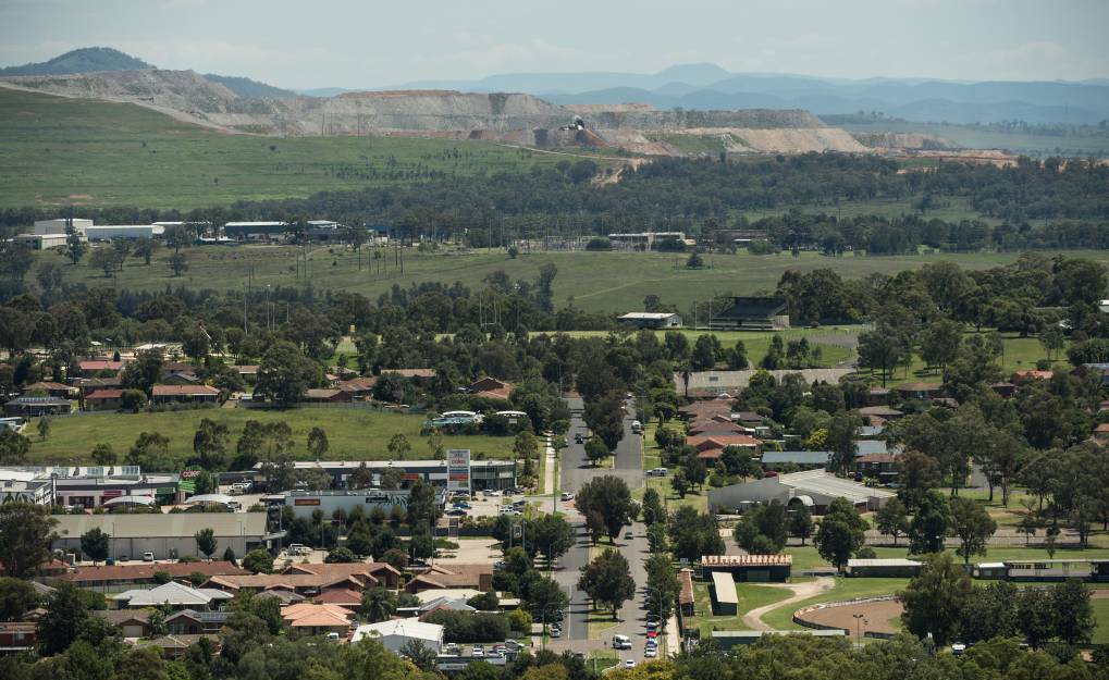 Proximity: Muswellbrook town with BHP's Mount Arthur coal mine in the background. Muswellbrook Shire Council has been ordered to pay the mine's legal bill after a failed bid to improve rehabilitation at the mine site.
