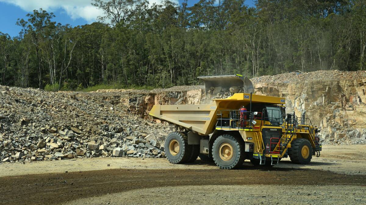 Operations: One of the trucks at Martins Creek Quarry in Dungog Shire. A council win has turned attention to the cost of the unlawful quarry expansion.