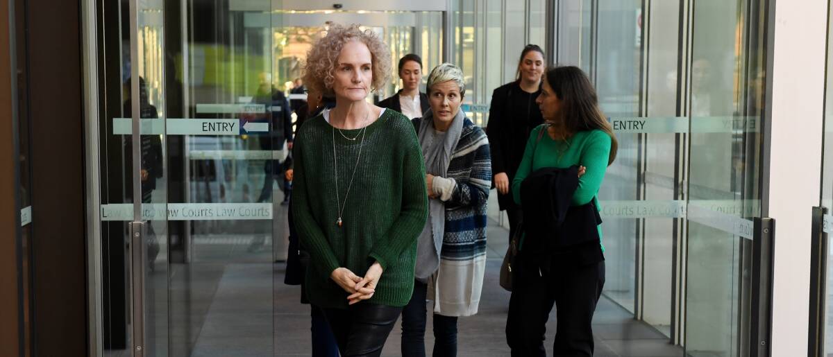 Determined: Women pelvic mesh victims leave the Federal Court in Sydney as a six-month class action against pelvic mesh manufacturer Johnson & Johnson takes place. A Senate inquiry is considering how mesh was cleared for use in Australia. 