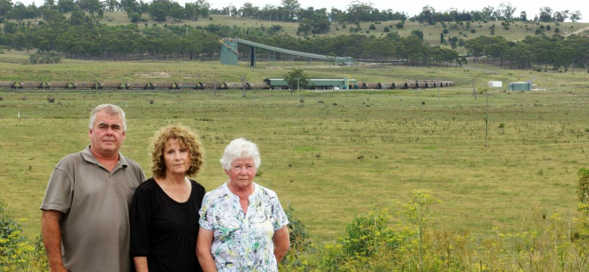 Trapped: Peter and Julie Brown and Mr Brown's mother June cannot live at their Wybong home because of the noise impacts of Glencore's Mangoola coal mine. Picture: Peter Stoop.