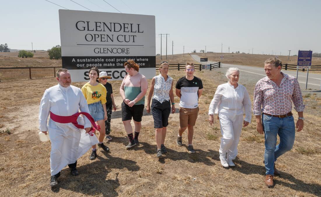 Object: Hunter teenagers and supporters outside Glencore's Glendell coal mine which is planning to more than double mine production in an expansion until 2044. Picture: Max Mason-Hubers.