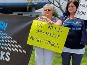 Report: New Zealand pelvic mesh-injured women protest before a report's release on Thursday.
