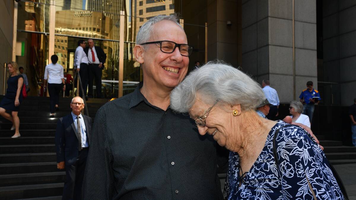 Relief: Former Newcastle Anglican Bishop Greg Thompson and Hamilton woman Audrey Nash outside the Royal Commission into Institutional Responses to Child Sexual Abuse hearing rooms in December, 2017 where the commissioners were thanked.
