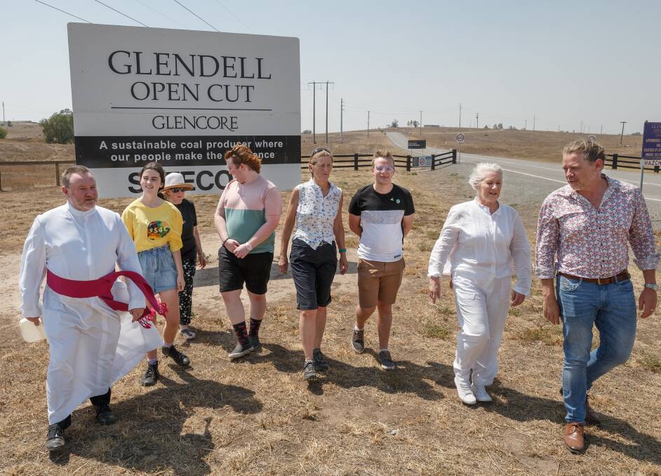 Opposed: Students and supporters outside Glencore's Glendell coal mine near Singleton. Students are opposed to a mine expansion plan to more than double annual production until 2044. Picture: Max Mason-Hubers.