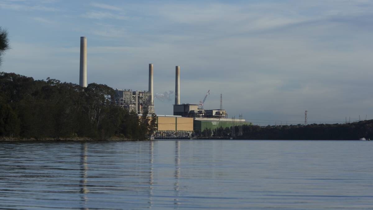 Warnings: Vales Point power station on the shores of Lake Macquarie. A new report has raised serious concerns about the long term environmental impact of coal ash dams.
