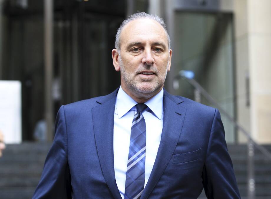 Advice: Hillsong Christian Church leader Brian Houston leaves the Royal Commission into Institutional Responses to Child Sexual Abuse in 2014 after giving evidence about his knowledge of child sex allegations against his father, Frank. 