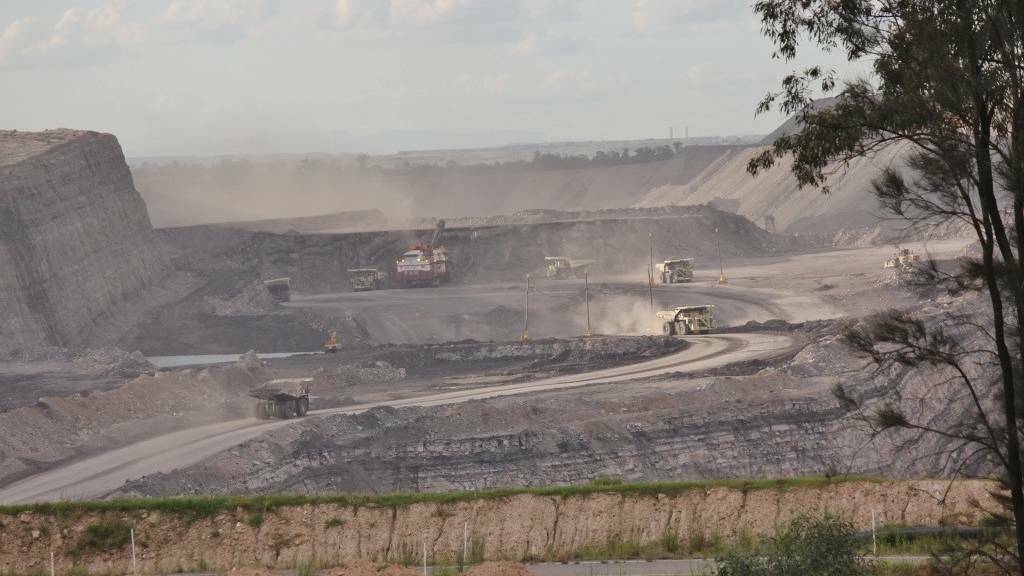 Extraction: A Hunter coal mine. The coal workers' union says the NSW Government has not gone far enough to stop courts and the Independent Planning Commission from refusing mines because of greenhouse gas emissions from Hunter coal burnt overseas.
