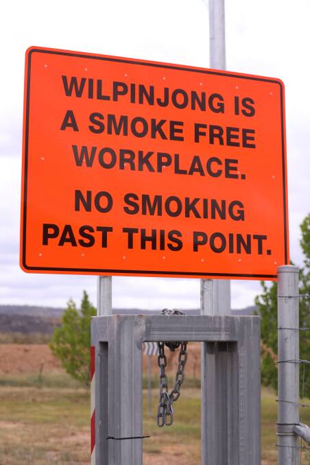 Warning: A sign outside the Peabody coal mine of Wilpinjong between Denman and Mudgee. The mine produces coal for Bayswater and Liddell power stations.