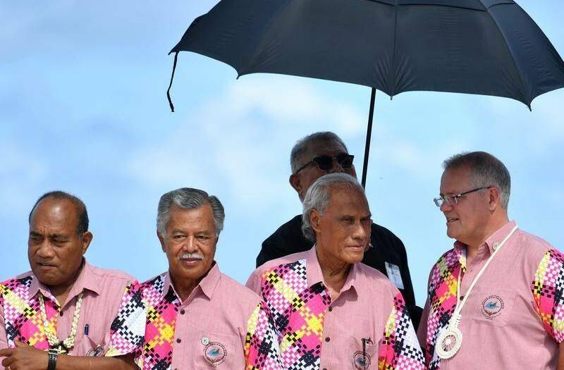Commitment: Prime Minister Scott Morrison with other leaders at the Pacific Island Forum in August, 2019 where Australia was strongly criticised for its lack of commitment to reduce greenhouse gas emissions. 