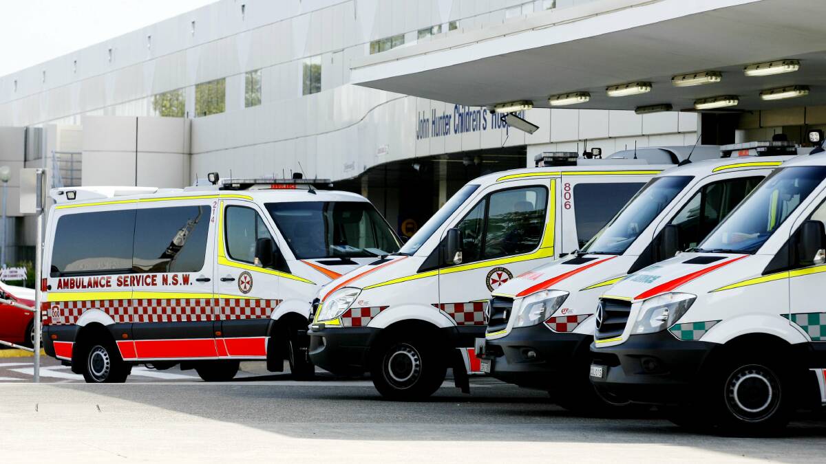 Emergency: Ambulances lined up outside John Hunter Hospital emergency department. Hunter New England Health stopped public holiday pay to emergency staff specialists not rostered on to work in August, 2016. The Industrial Relations Commission has told the health service to restore the pay.