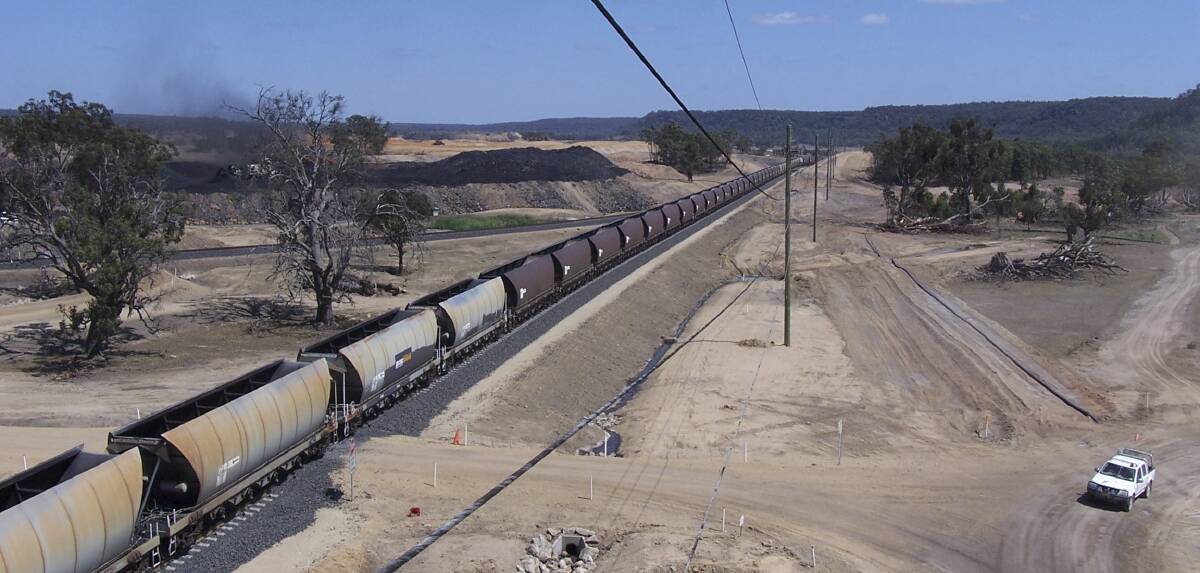 Large: A coal train near the Wilpinjong coal mine between Denman and Mudgee.