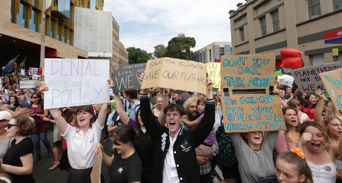 Protest: Students march through Newcastle in March as part of the global student strike for climate action. Picture: Simone De Peak