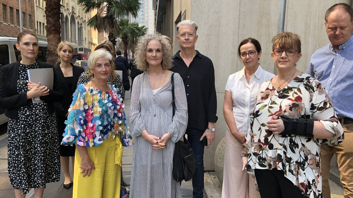 History: Pelvic mesh victims and their lawyer Rebecca Jancauskas (far left) outside the Federal Court in Sydney this morning before a landmark decision in the Johnson & Johnson pelvic mesh case.
