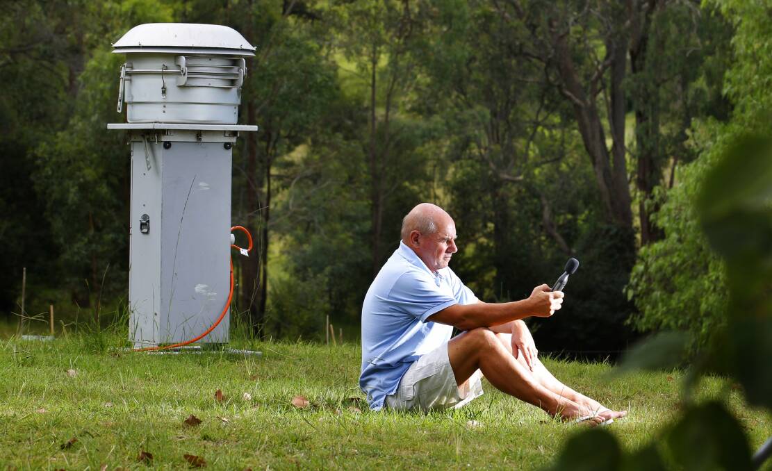 Warnings: Bulga resident Alan Leslie monitoring the impacts of nearby open cut coal mines. He is one of a group seeking a meeting with the Environment Protection Authority about Hunter air quality monitoring.