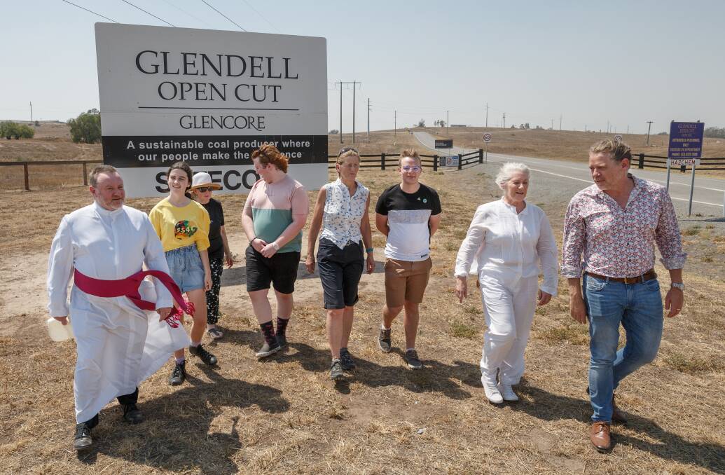 Support: Teenagers and their adult supporters outside Glencore's Glendell coal mine near Singleton. The teens want an end to Hunter coal mine expansions. Picture: Max Mason-Hubers.