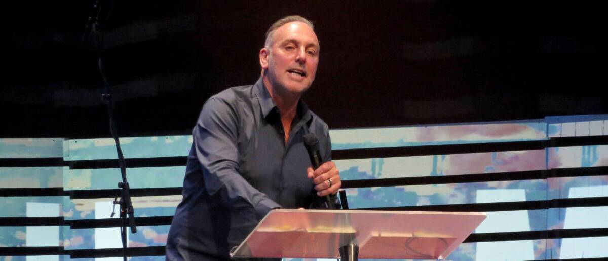 Message: Hillsong Church founder Brian Houston preaching to a New York congregation. Picture: Dominic Lorimer. 