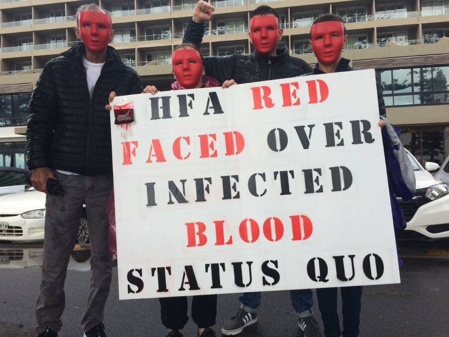 Protests: People infected with hepatitis C after treatment for haemophilia decades ago protest outside a Haemophilia Foundation Australia conference in Sydney on Friday.