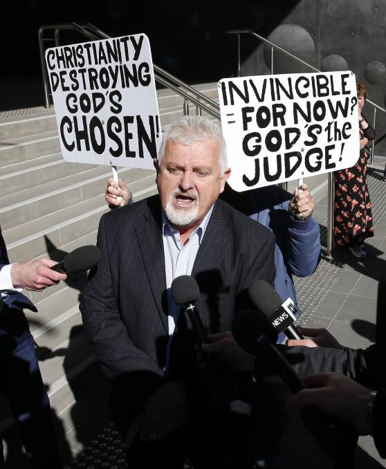 Outraged: Hunter abuse survivor Peter Gogarty outside Newcastle Courthouse on Tuesday when a Philip Wilson supporter called him "rubbish". Picture: Darren Pateman.