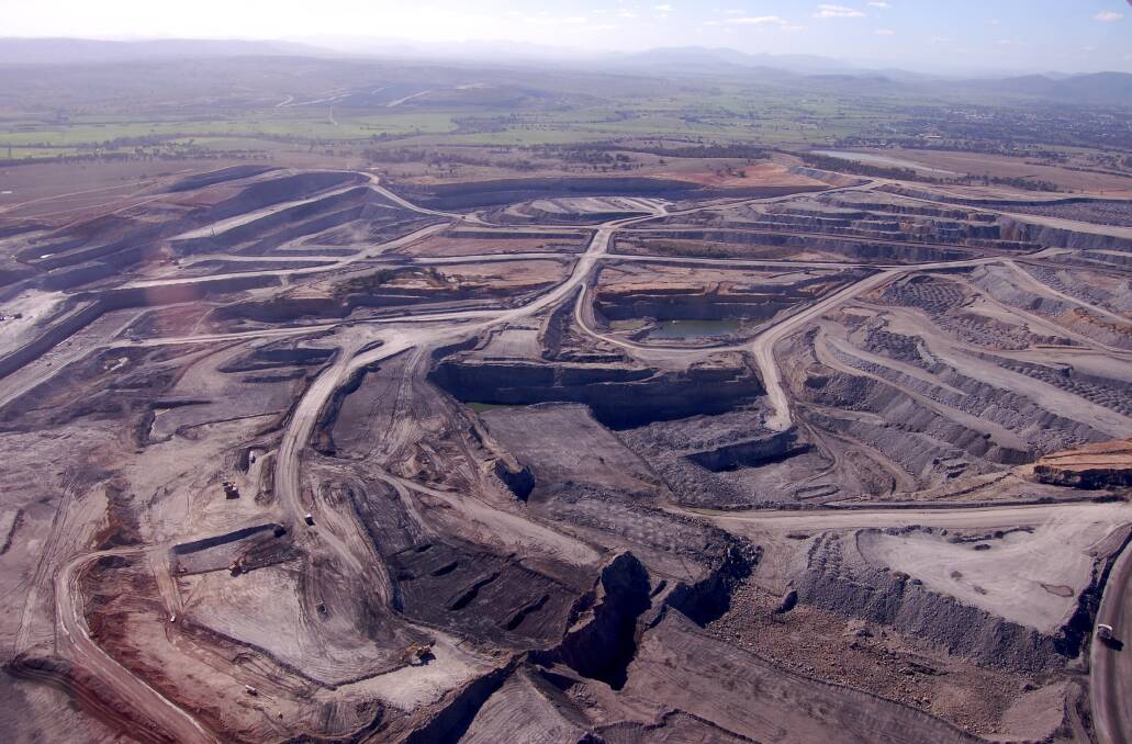 Criticism: Critics of government responses to worsening Upper Hunter air quality say large tracts of exposed land on open cut coal mine sites cause some of the problem.