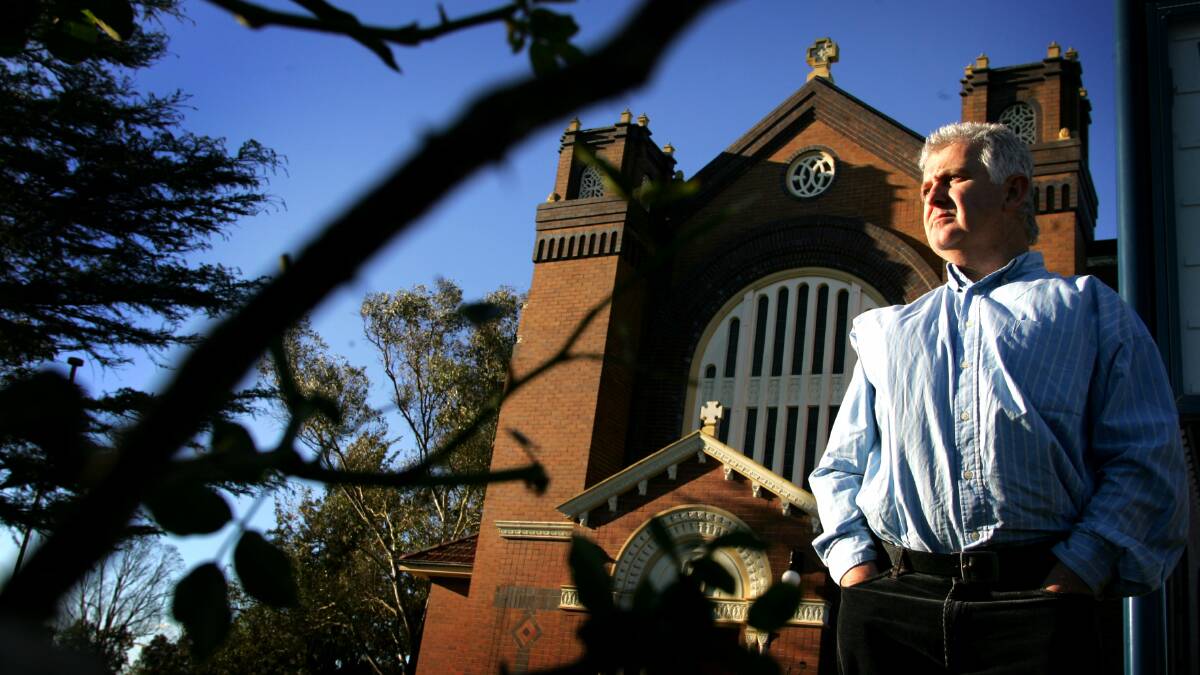Champion: Peter Gogarty outside the church where Catholic child sex offender priest Jim Fletcher presided. Mr Gogarty will give evidence at the Royal Commission into Institutional Responses to Child Sexual Abuse on Monday about the need for laws to charge people who protected child sex offenders. 