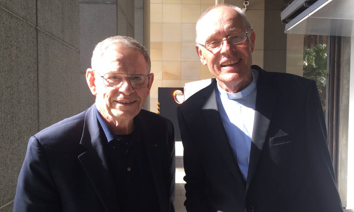 Evidence: American canon lawyer Father Tom Doyle (left) with parish priest and theologian Dr Michael Whelan outside the Royal Commission in Sydney. Dr Whelan believes radical change is needed in the Catholic Church.